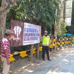 Operasi Patuh 2024 Satlantas Polres Malang Intensifkan Imbauan Tertib Lalu Lintas Melalui Pemasangan Spanduk
